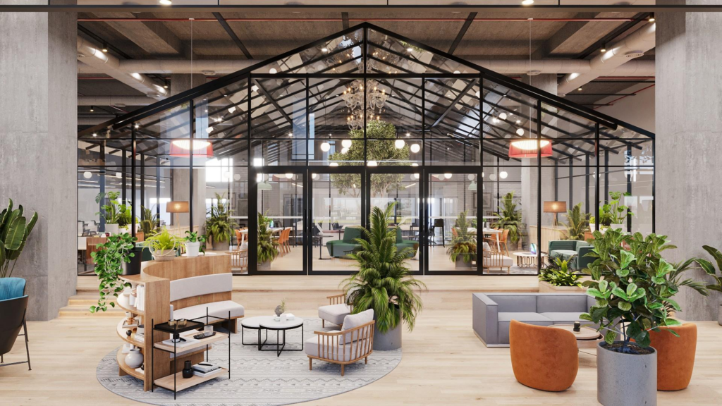 Industrial open floor: central greenhouse-style meeting structure in black steel and glass, exposed concrete columns, exposed services, lounge seating with biophilic planting.